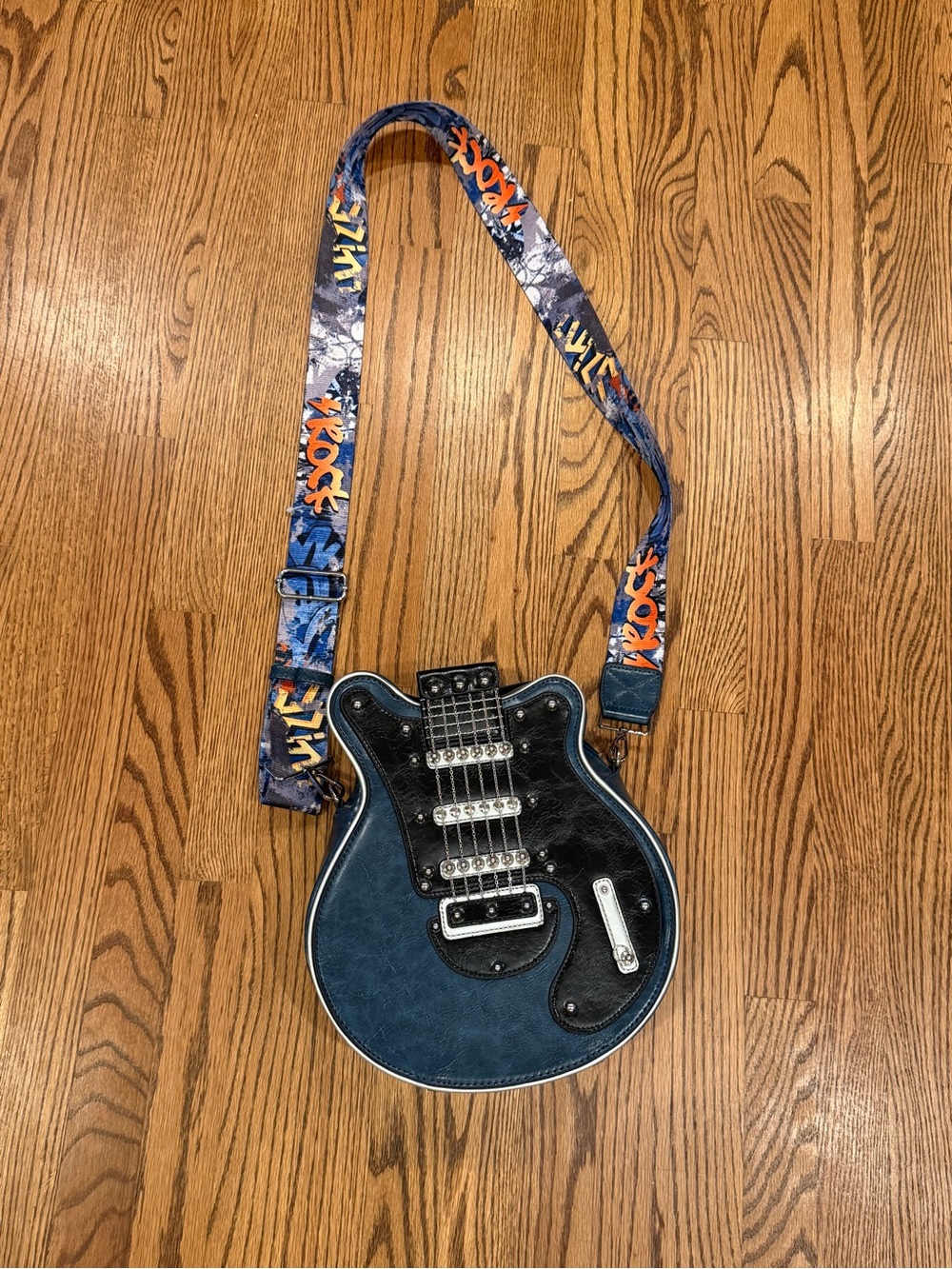 Blue Guitar-Shaped Crossbody Bag with Graphic Strap